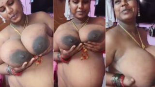 Nude Tamil milf proudly showing her huge milk tanks